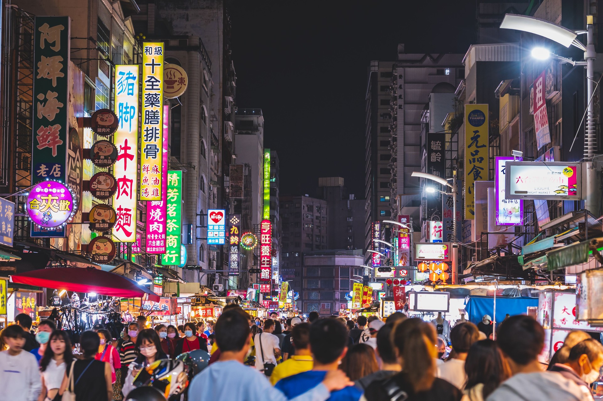 Unacquainted people in liuhe night market.The Liuhe Night Market is a tourist night market in Sinsing District, Kaohsiung. It is one of the most popular markets in Taiwan